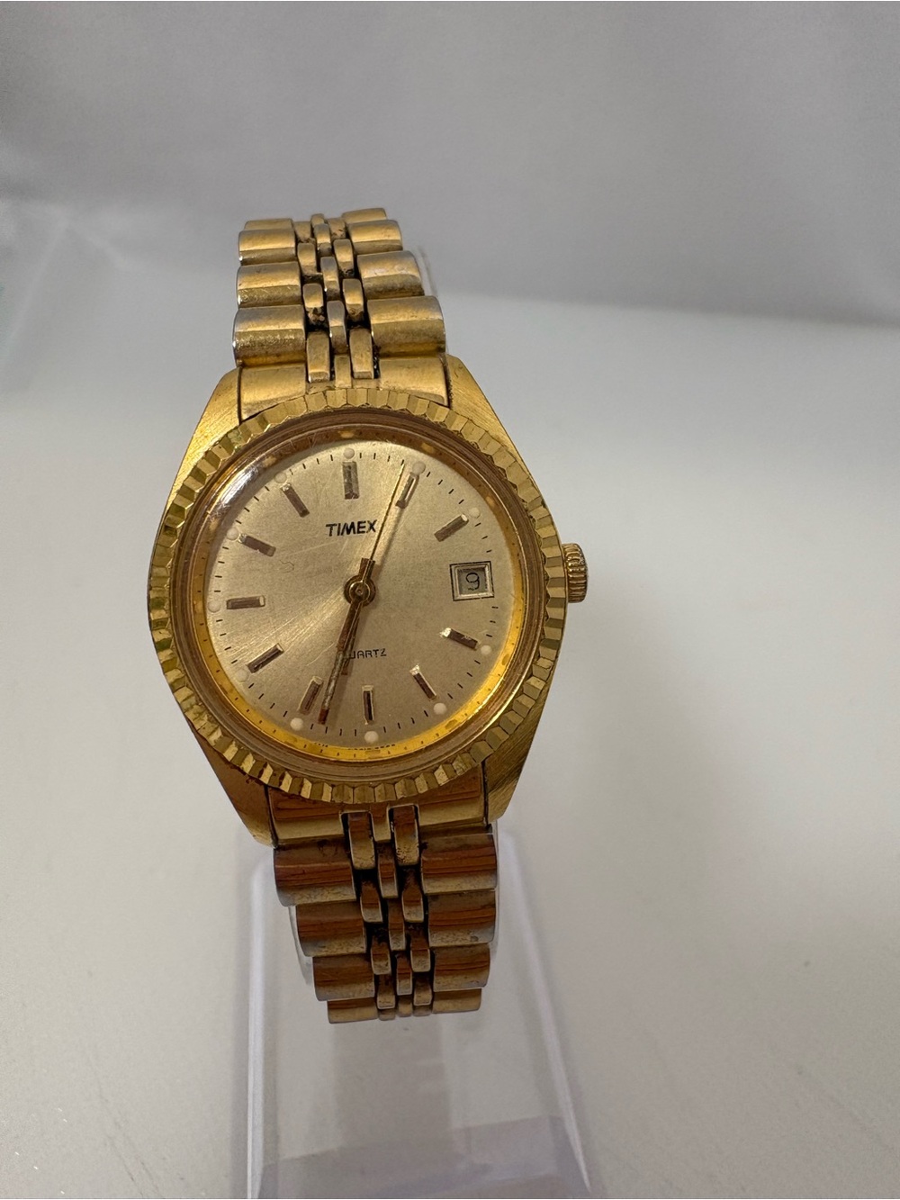 Vintage Women’s Timex Gold Tone Watch with Date on a Gold Dial